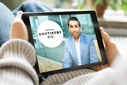 Dr. Patel giving a virtual dental consultation